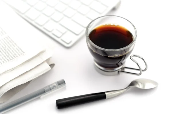 Coffee in glass cup with teaspoon — Stock Photo, Image