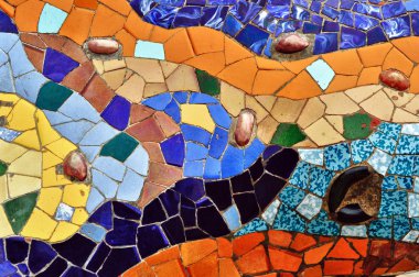 Detail of mosaic in Guell park in Barcelona clipart