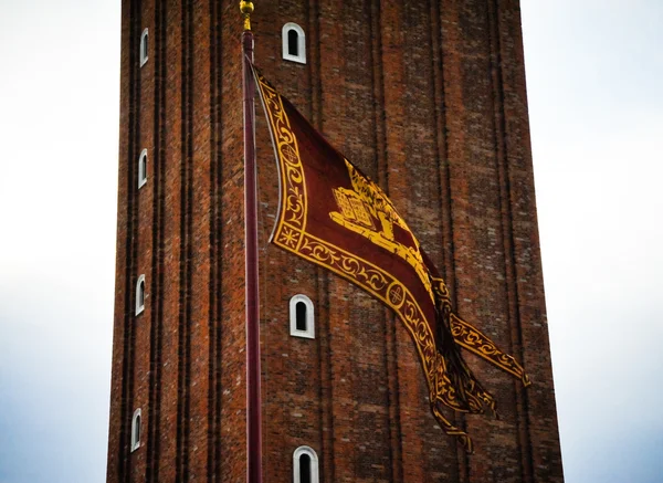 Venice flag and brick tower — Zdjęcie stockowe