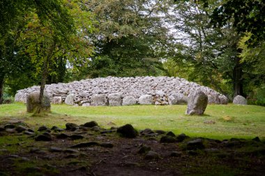 Chambered cairn and standing stones clipart