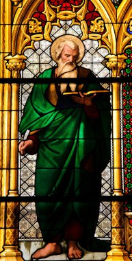 Church window in the Dom of Cologne, Germany, depicting Saint Matthew the Evangelist clipart