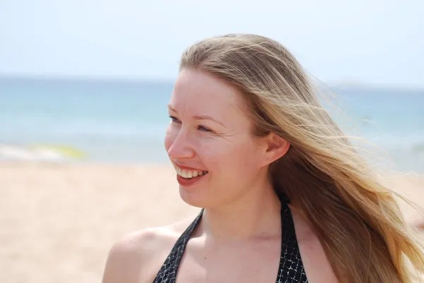 Stock image Blond smiling women with hair flying