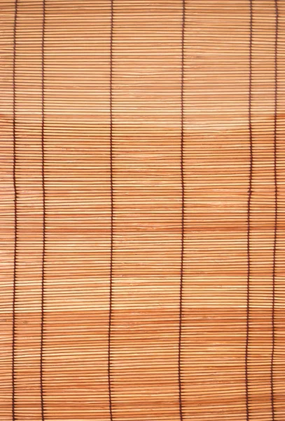 Bruin bamboe matting achtergrond en textuur — Stockfoto