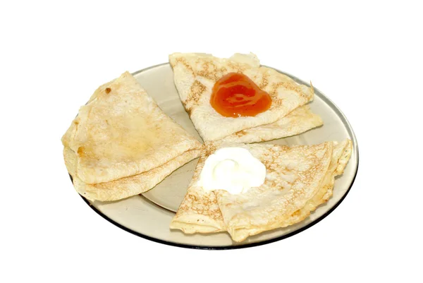 Three pancakes with jam, sour cream and honey — Stock Photo, Image