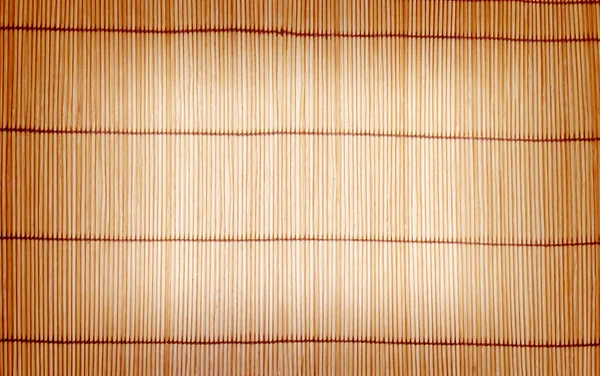 Fundo de esteiras de bambu marrom e textura — Fotografia de Stock
