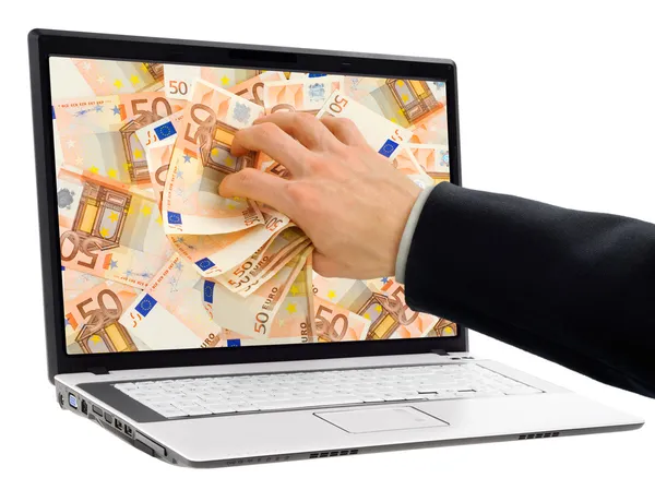 Taking money out of the screen — Stock Photo, Image