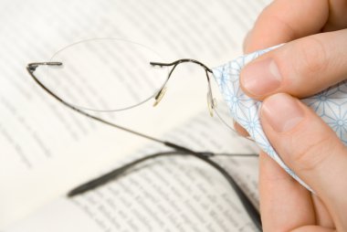 Cleaning eyeglasses clipart