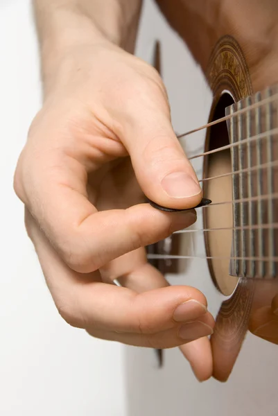 Picking the acoustic guitar — Stock Photo, Image