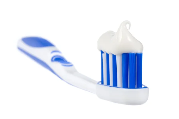 Ізольована зубна щітка з зубною пастою — стокове фото