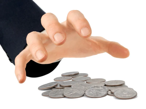 Hand reaching for coins — Stock Photo, Image