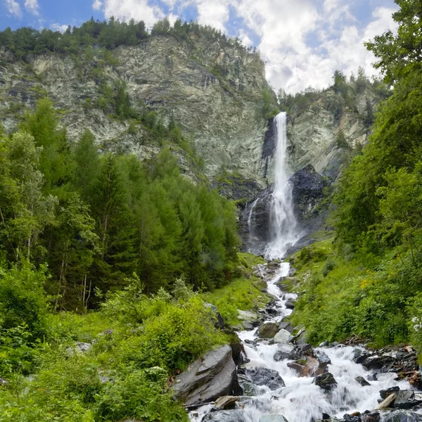 stock image Waterfall on large rock face