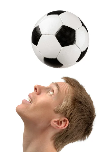 Jogador de futebol demonstrando cabeçalhos — Fotografia de Stock