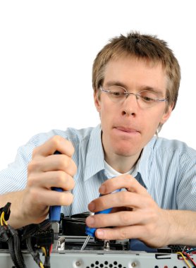 Young technician repairing a PC clipart