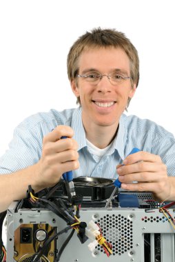 Studio shot of a young support technician with a trustworthy smile repairing a computer clipart