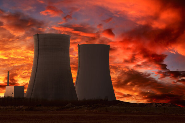 Nuclear power plant with an intense red sky