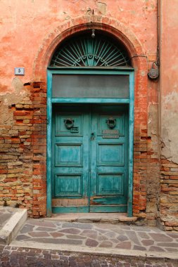 Old door of a house clipart