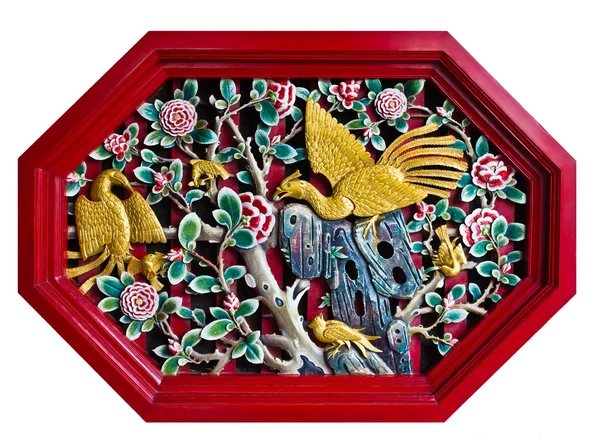 Vyřezávané swan a květin obrázek, červený osmiúhelník — Stock fotografie
