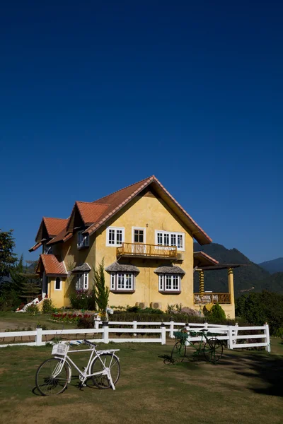stock image Yellow classic house on hill, pai, maehongson, thailand