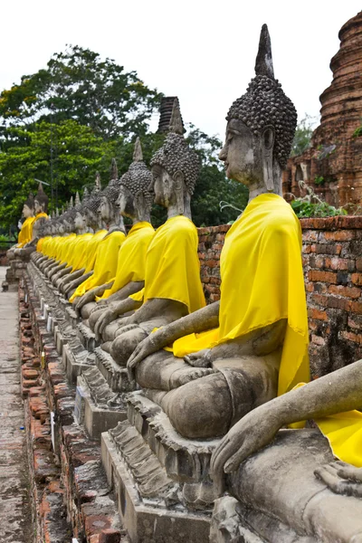 Row of Sacred Buddha images in Ayuthaya, Thailand — Stock Photo, Image