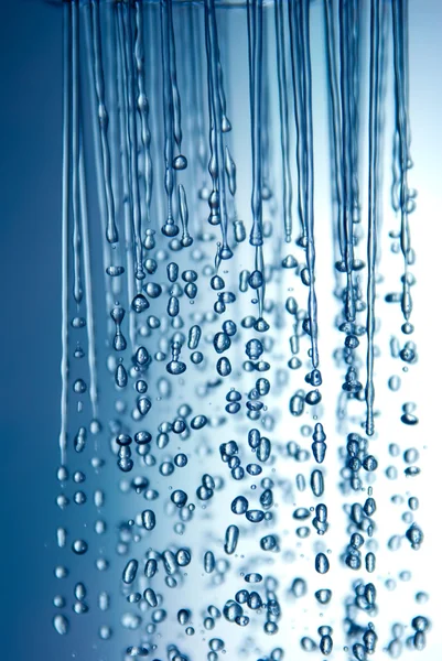 Niebieski prysznic krople — Zdjęcie stockowe