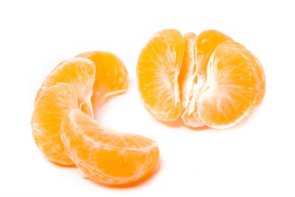 Mandarin without a peel and four segments — Stock Photo, Image
