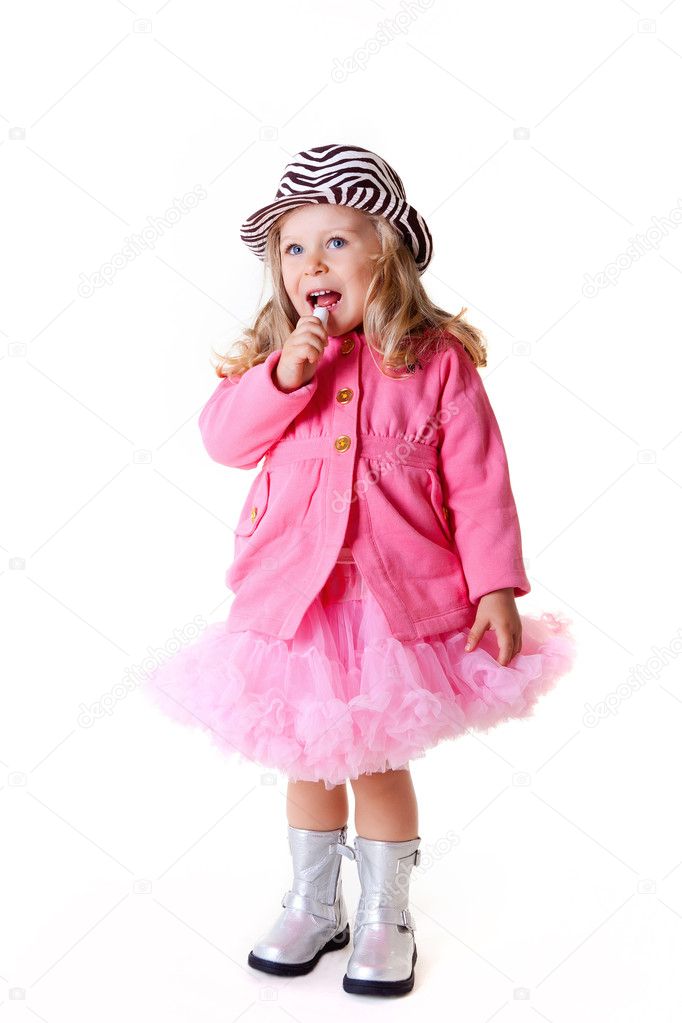 Beautiful sweet toddler girl with lipstick