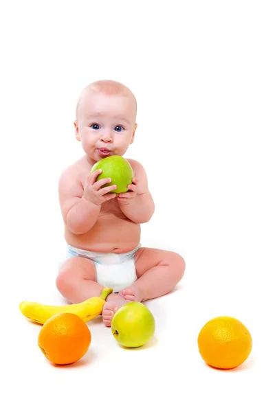 Cute little baby with fruits — Stock Photo, Image