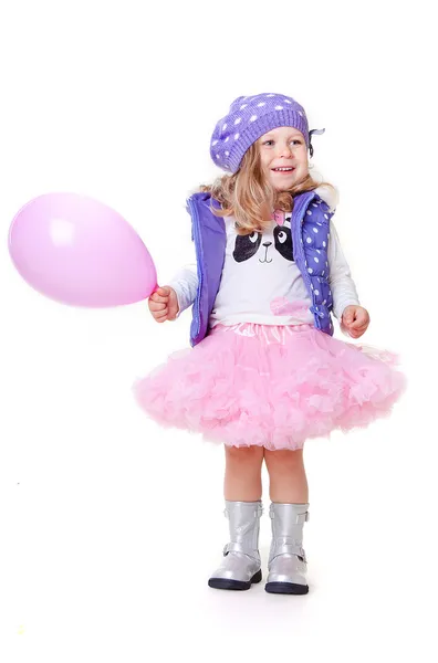 Schattig klein meisje met roze ballon — Stockfoto
