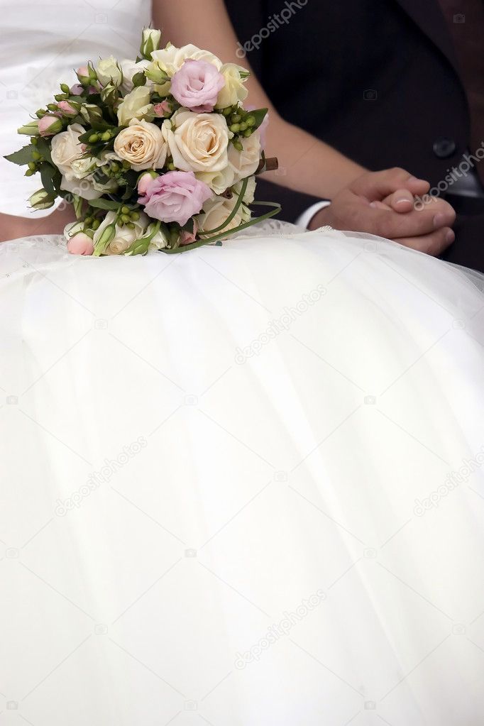 Bouquet in wedding dress