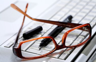 Keyboard and glasses clipart