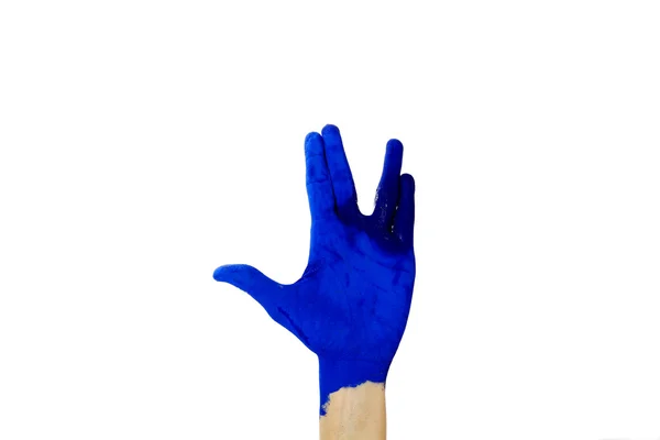 Blauwe hand met uitknippad — Stockfoto