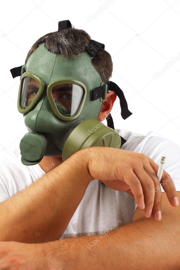 Gas mask man chilling and smoking a cigarette