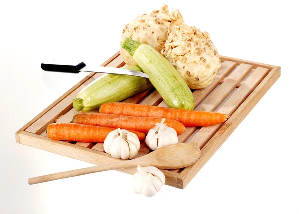 Vegetable on a wooden plate — Stock Photo, Image