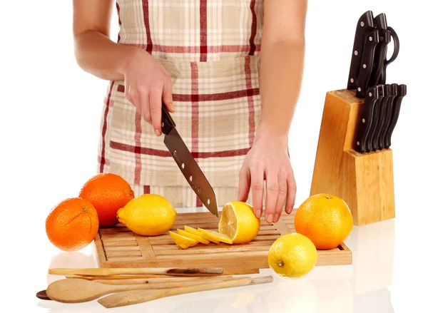 Girl Cutting Lemons Knife Wooden Plate — Stock Photo, Image