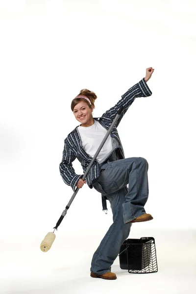 Young girl with painting equipment, dancing — Stock Photo, Image