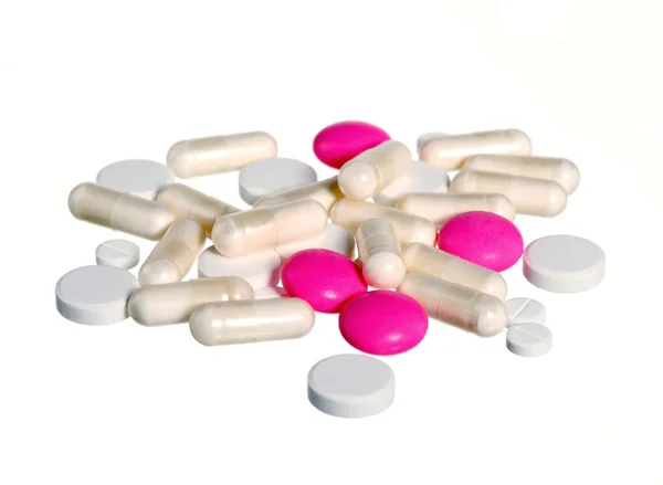 Rózsaszín és fehér tabletta, elszigetelt — Stock Fotó