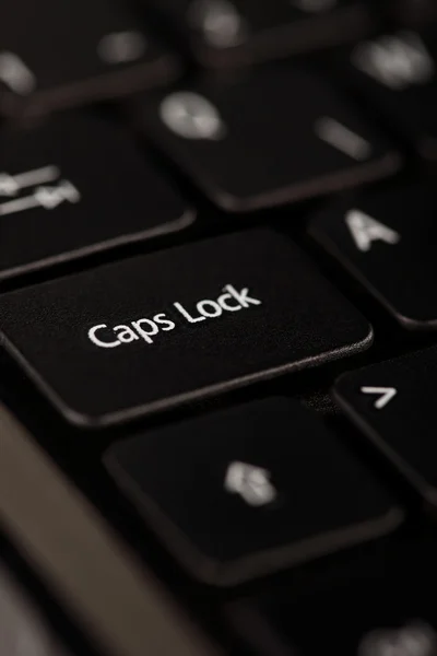 Svart anteckningsboken klaviatur, mössa låsa nyckel — Stockfoto