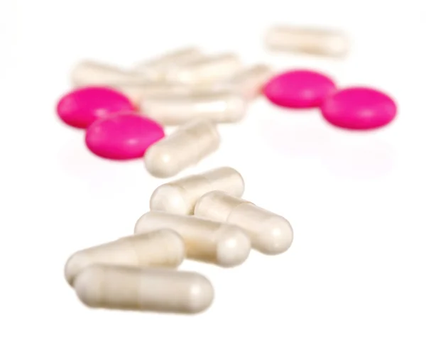 Píldoras blancas y rosadas —  Fotos de Stock