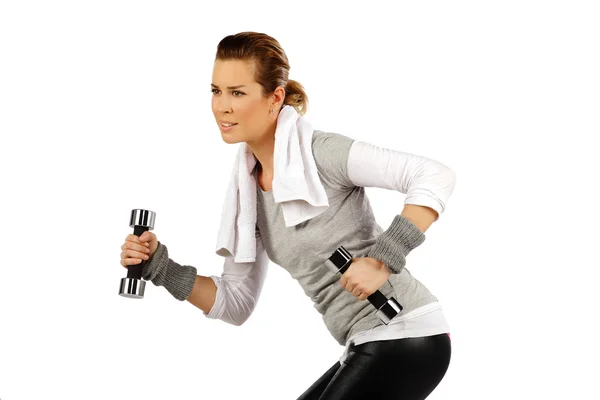 Chica haciendo ejercicio con pesas —  Fotos de Stock