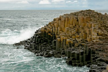 The Giants Causeway is the result of an ancient volcanic activity clipart