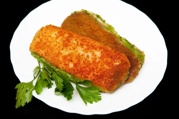 Рыба со шпинатом — стоковое фото