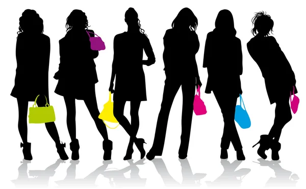 Silhouette delle ragazze con borse colorate — Vettoriale Stock