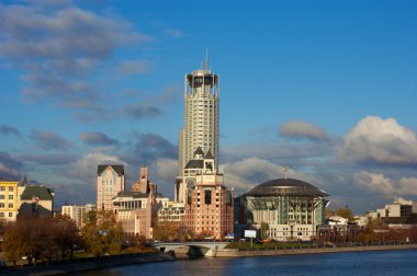 Business buildings near river clipart