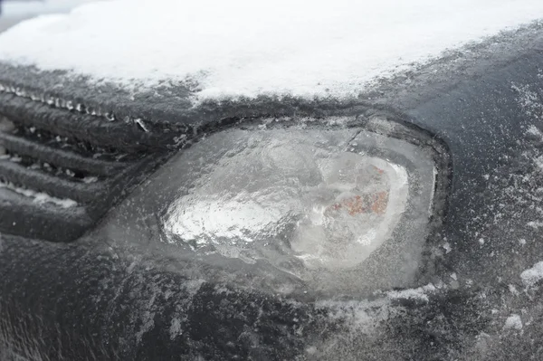 Frozen Car Ice Headlight Royalty Free Stock Images