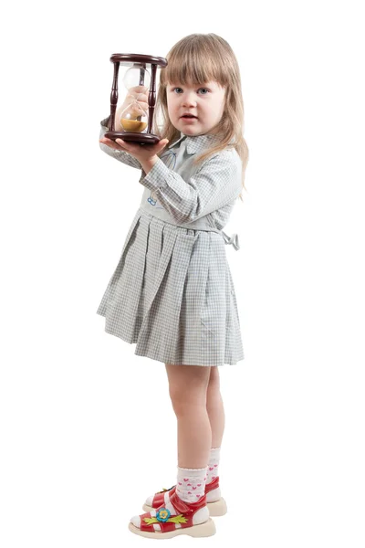 Young girl with hourglass — Stock Photo, Image