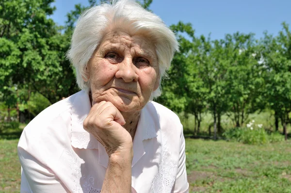 An elderly woman, thought — Stock Photo, Image