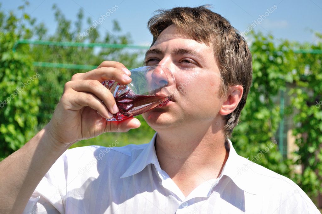 Man drinks chilled cherry juice