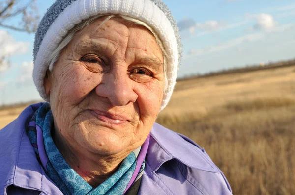 Joyful, an elderly woman — Stock Photo, Image