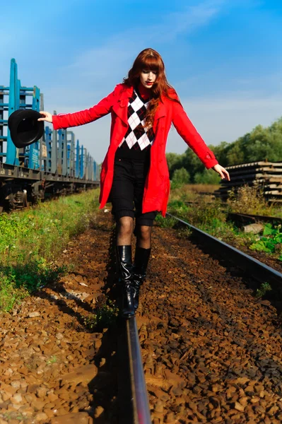 Young Red Haired Woman Going Railroad Tracks Brightly Red Jacket — Stock Photo, Image