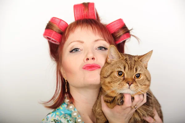 Housewife with a cat — Stock Photo, Image